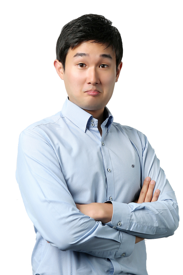 Eric Kim, SAT instructor, in a light blue shirt